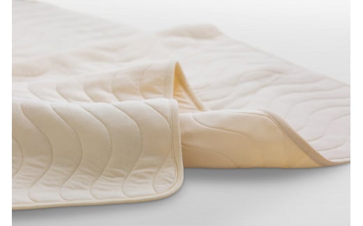 爽やかベッドパッドの羊毛シート綿を入れて、肌沿い性の良いマルチケットを開発しました