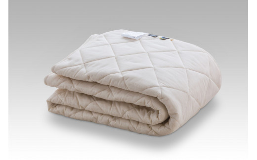 多層敷ふとんをベッドパッドとして開発した、家庭の洗濯機で水洗いできる三層構造の羊毛ベッドパッドです。